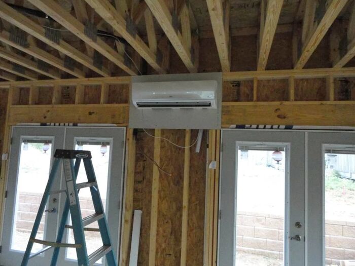 Ductless head set into a room under construction