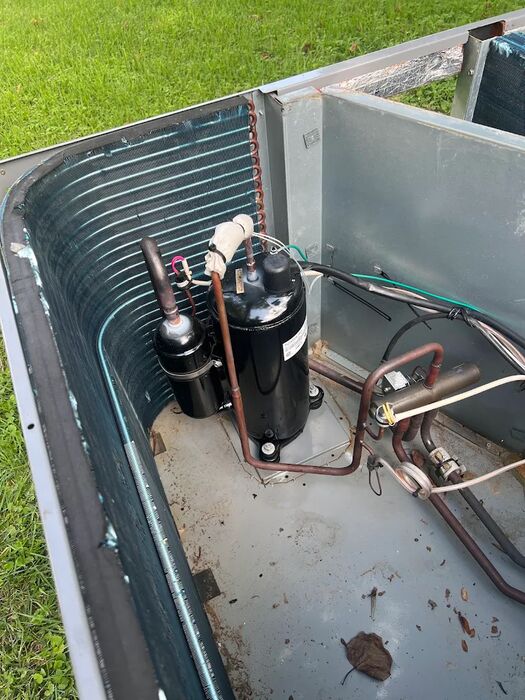 Compressor and line set exposed for repair
