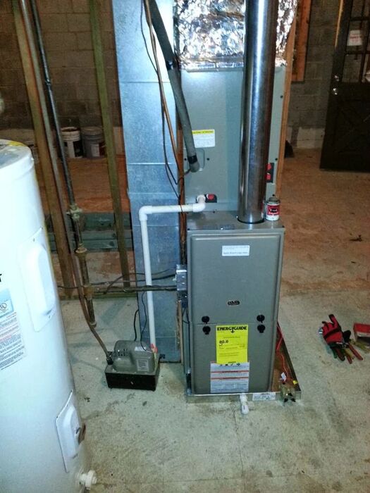 Gas furnace and water heater in a home mechanical room